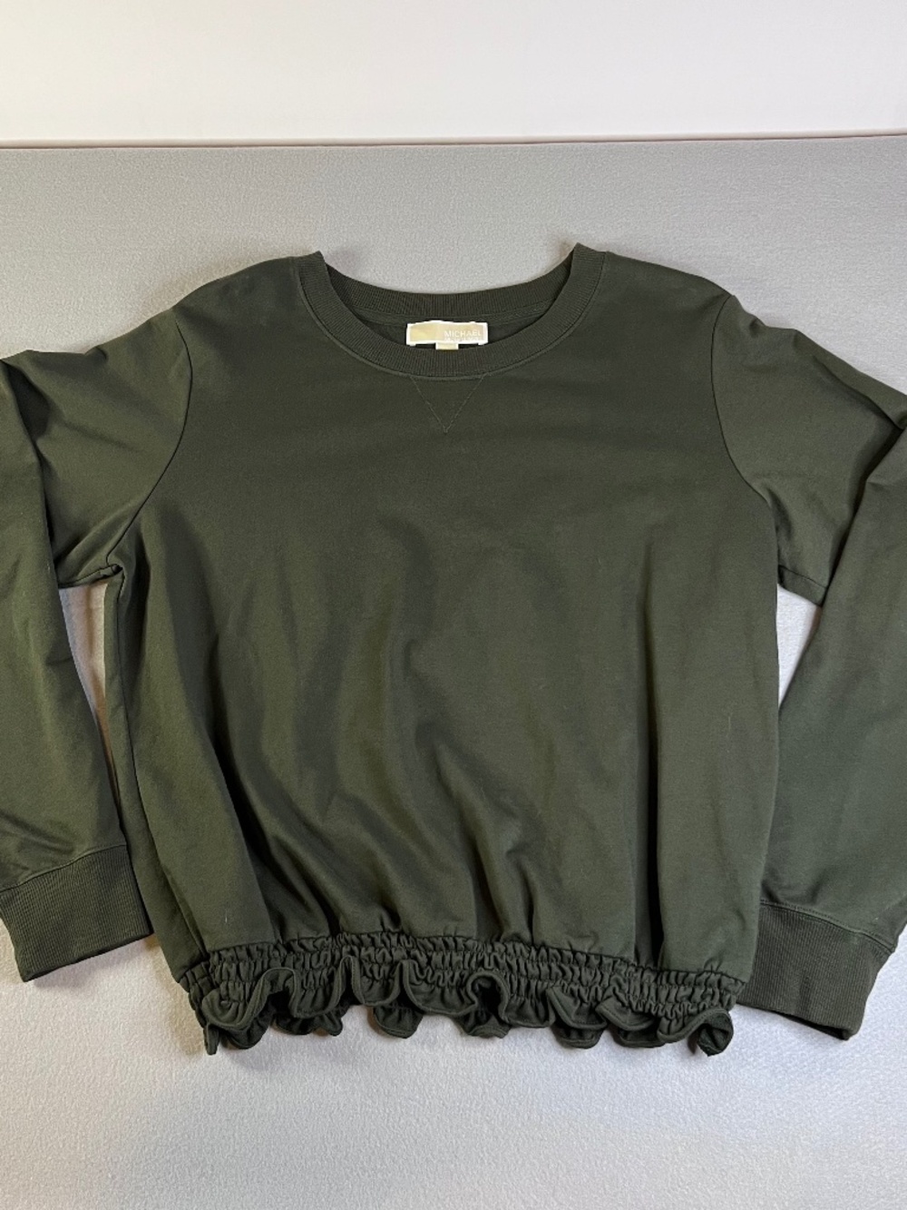 Michael Kors Olive Green long Sleeve Top Ruched Ruffle Bottom. Womens Large